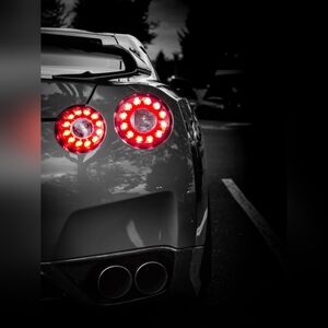 Black Sports Car with Red Tail Lights